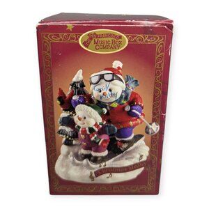 San Francisco Music Box Company "Christmas Medley" Sledding Snowman Ornament